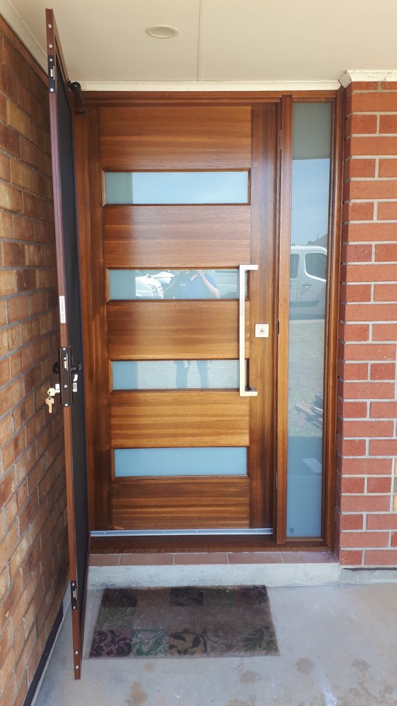 After - Wooden door replacement with open wooden security screen