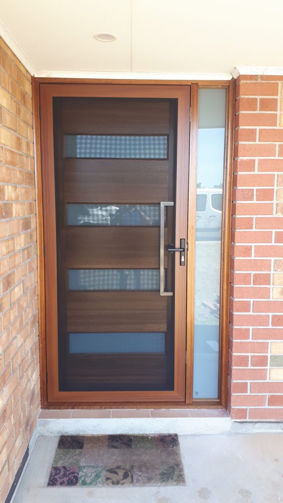 After - Wooden door replacement with open wooden security screen closed